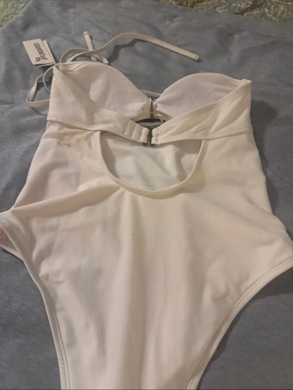 No Boundaries Cream One-Piece Swimsuit with Decorative Medallion